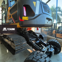 Excavadora híbrida Con Orguas y ruedas para transporte 4