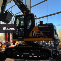 Excavadora híbrida Con Orguas y ruedas para transporte 2